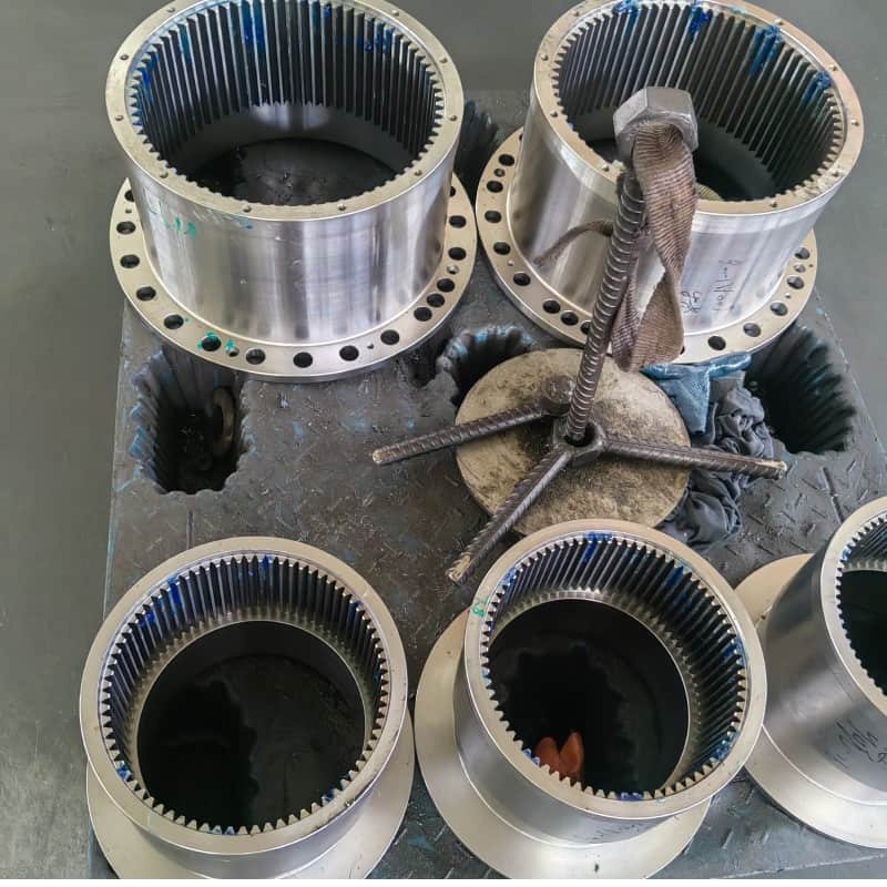 Large cast alloy steel internal ring gear with fully CNC machined teeth and mounting holes for heavy duty reducer transmission